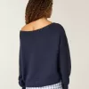Maglione largo con spalle scoperte