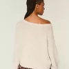Maglione largo con spalle scoperte