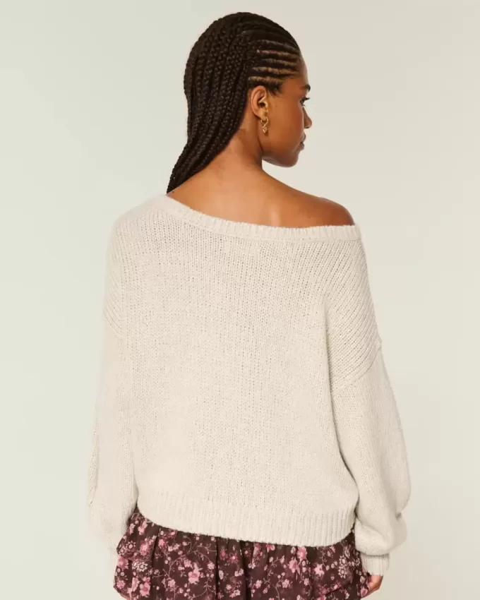 Maglione largo con spalle scoperte