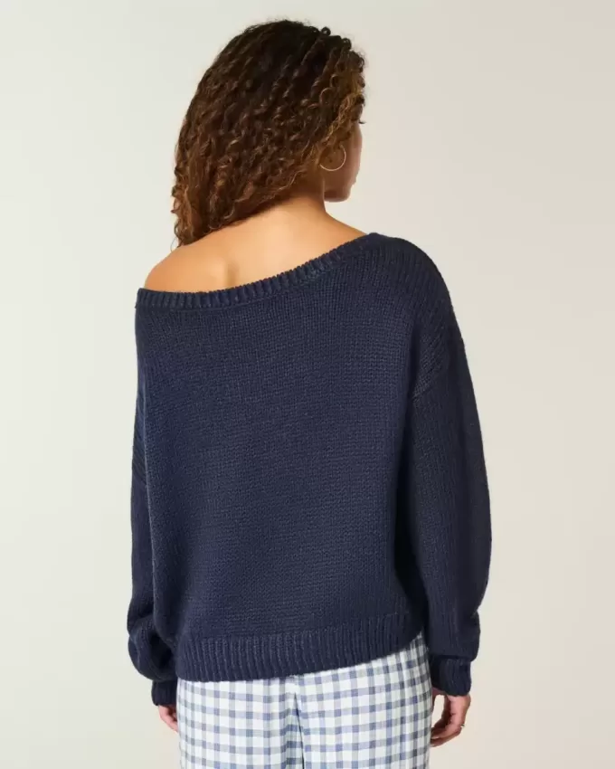 Maglione largo con spalle scoperte