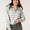 Maglione oversize con mezza zip e grafica
