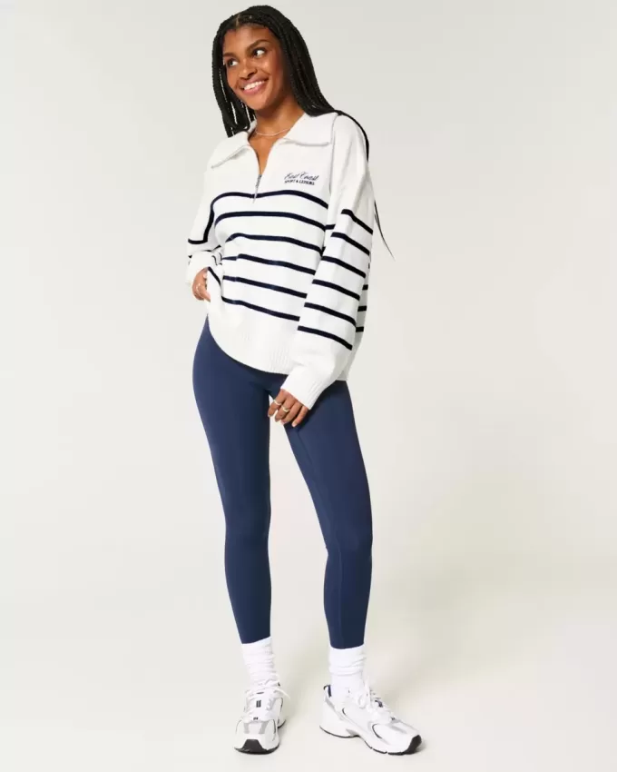 Maglione oversize con mezza zip e grafica