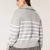 Maglione oversize con mezza zip e grafica
