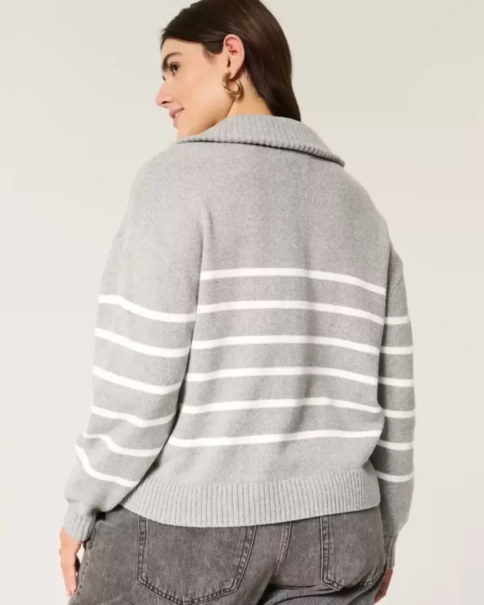 Maglione oversize con mezza zip e grafica