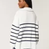 Maglione oversize con mezza zip e grafica