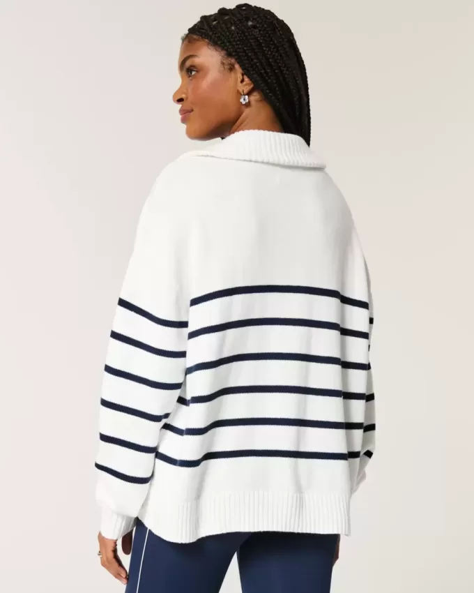 Maglione oversize con mezza zip e grafica