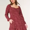 Mini abito a maniche lunghe con scollo a V
