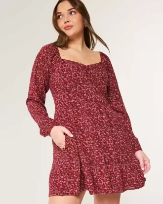 Mini abito a maniche lunghe con scollo a V