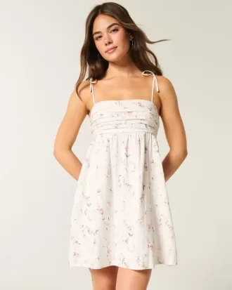 Mini abito babydoll con spalline annodate