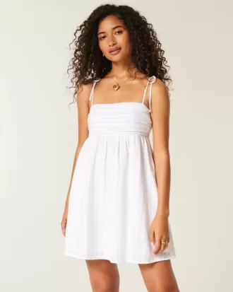 Mini abito babydoll con spalline annodate
