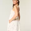Mini abito babydoll con spalline annodate