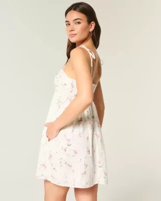 Mini abito babydoll con spalline annodate
