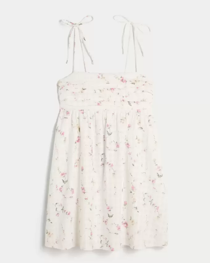 Mini abito babydoll con spalline annodate