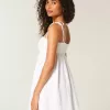 Mini abito babydoll con spalline annodate