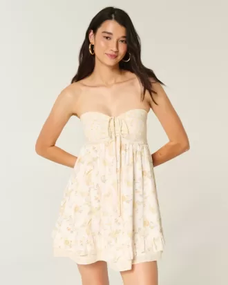 Mini abito babydoll senza spalline con volant