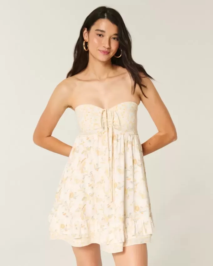 Mini abito babydoll senza spalline con volant