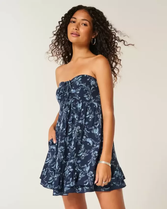 Mini abito babydoll senza spalline con volant