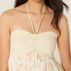 Mini abito babydoll senza spalline con volant