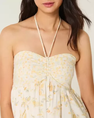 Mini abito babydoll senza spalline con volant