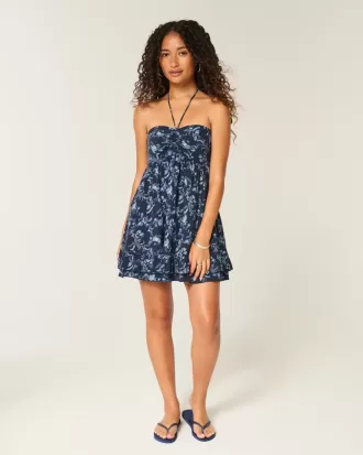 Mini abito babydoll senza spalline con volant