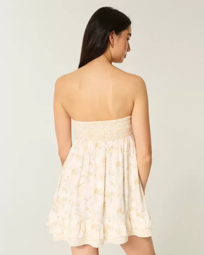 Mini abito babydoll senza spalline con volant