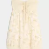 Mini abito babydoll senza spalline con volant