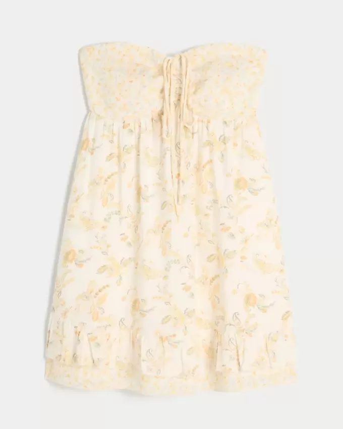 Mini abito babydoll senza spalline con volant