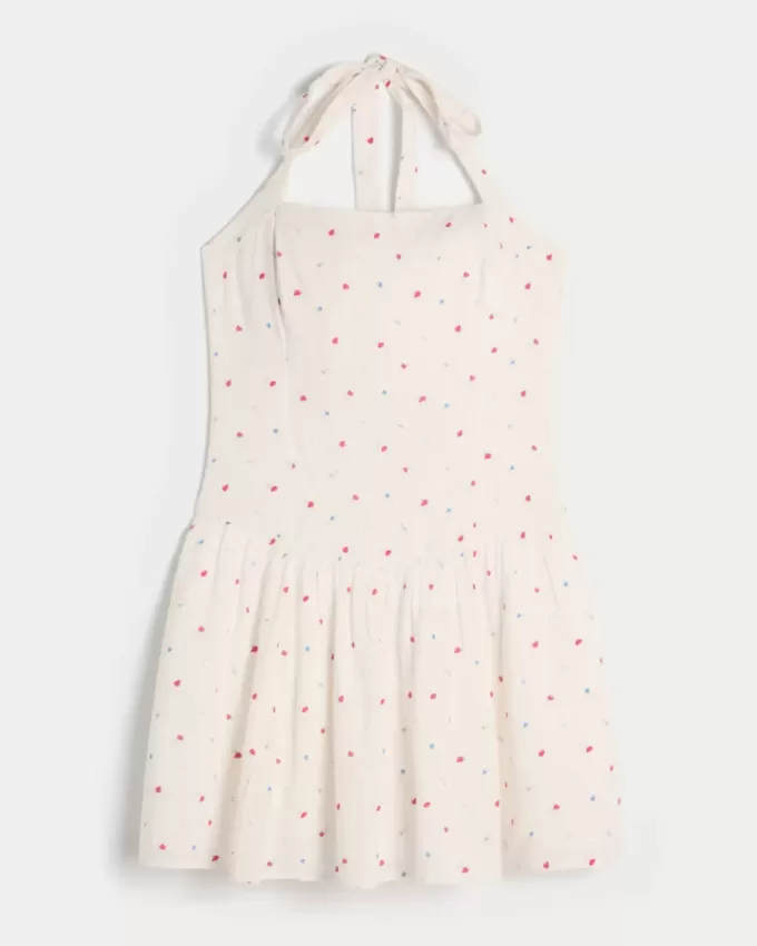 Mini abito con scollo all’americana e vita bassa