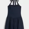 Mini abito con scollo all’americana e vita bassa
