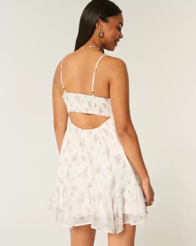 Mini abito in chiffon con orlo asimmetrico