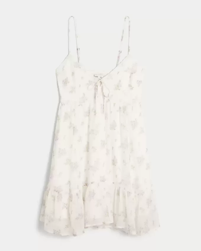 Mini abito in chiffon con orlo asimmetrico