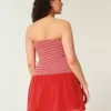 Mini abito in maglia senza spalline con vita bassa
