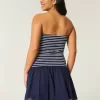 Mini abito in maglia senza spalline con vita bassa