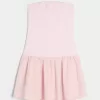 Mini abito in maglia senza spalline con vita bassa