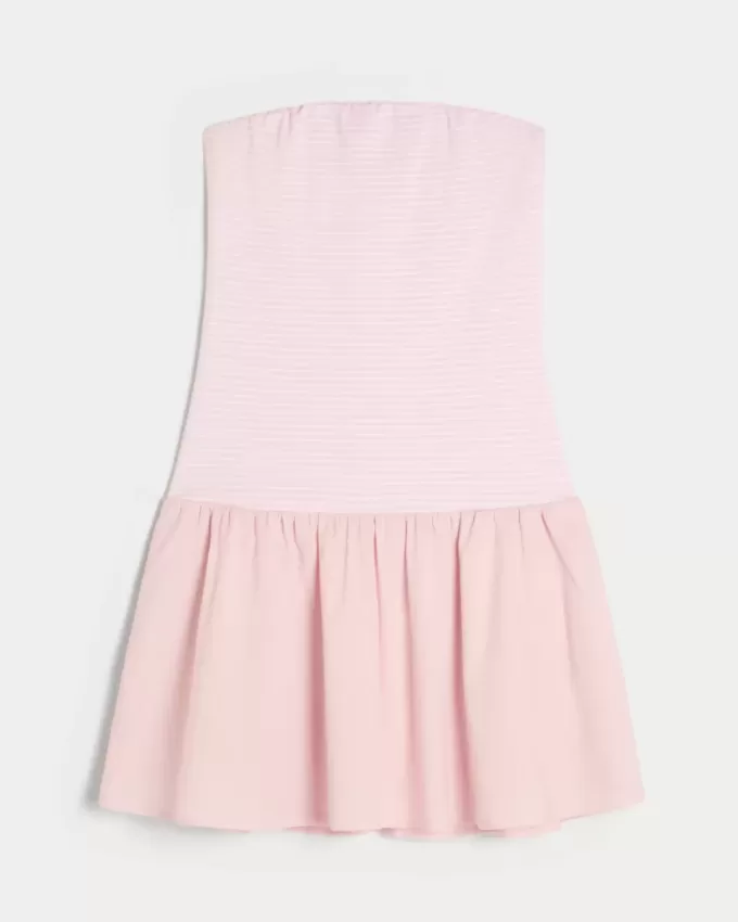 Mini abito in maglia senza spalline con vita bassa