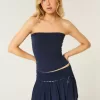 Mini gonna-pantalone a balze arricciate