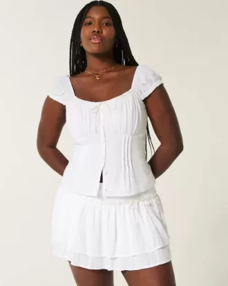 Mini gonna-pantalone a balze arricciate