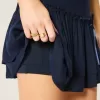 Mini gonna-pantalone a balze arricciate