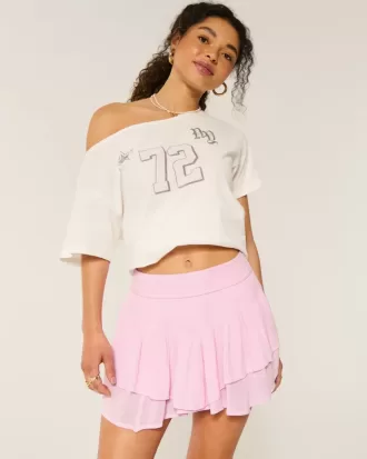 Mini gonna pantalone a strati con orlo asimmetrico