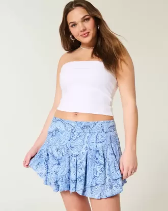 Mini gonna pantalone a strati con orlo asimmetrico