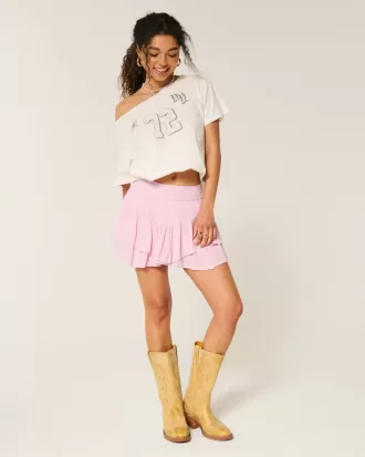 Mini gonna pantalone a strati con orlo asimmetrico