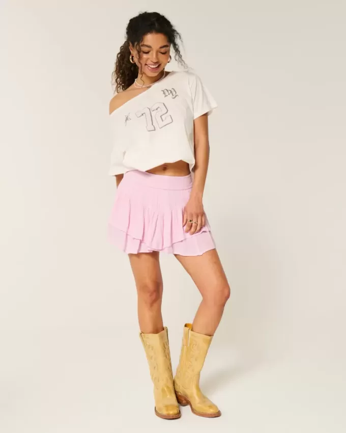 Mini gonna pantalone a strati con orlo asimmetrico
