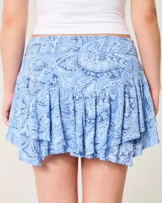 Mini gonna pantalone a strati con orlo asimmetrico