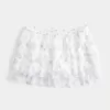 Mini gonna-pantalone in chiffon a strati