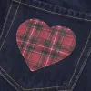 Mini gonna-pantalone in denim a quadri lavaggio scuro a vita bassa con tasche