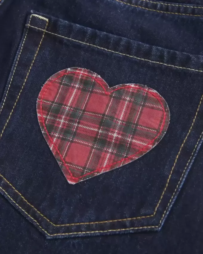 Mini gonna-pantalone in denim a quadri lavaggio scuro a vita bassa con tasche