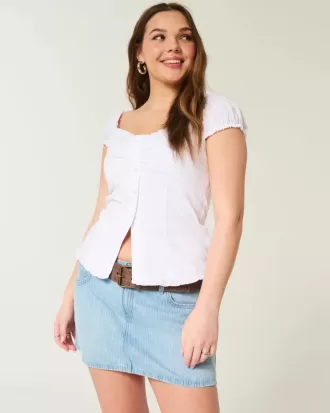 Mini gonna-pantalone in denim a righe a vita bassa