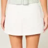 Mini gonna-pantalone in denim a vita bassa