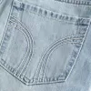 Mini gonna-pantalone in denim a vita bassa Mini gonna-pantalone in denim a vita bassa