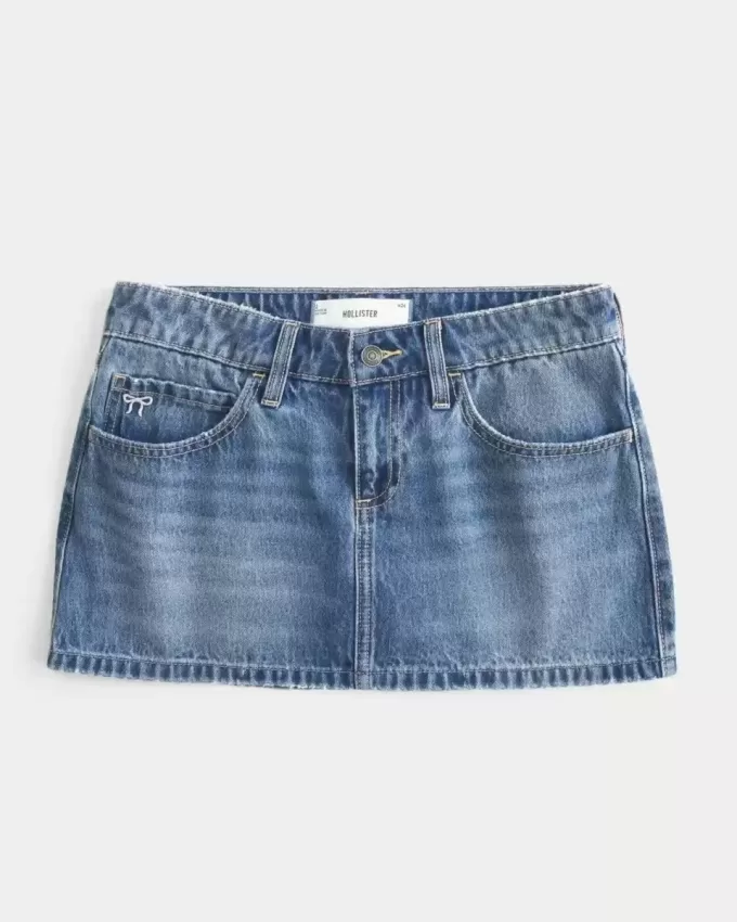 Mini gonna-pantalone in denim a vita bassa con fiocco ricamato